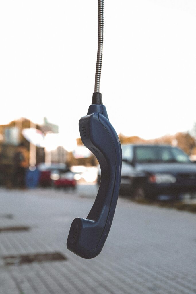 hanging telephone hand